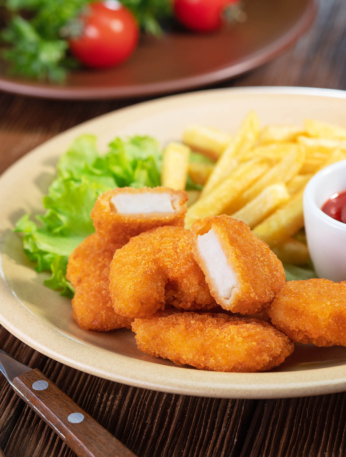 chicken nuggets with french fries and sause